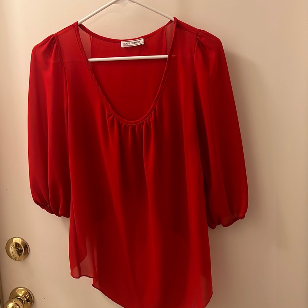 Red sheer top with open back